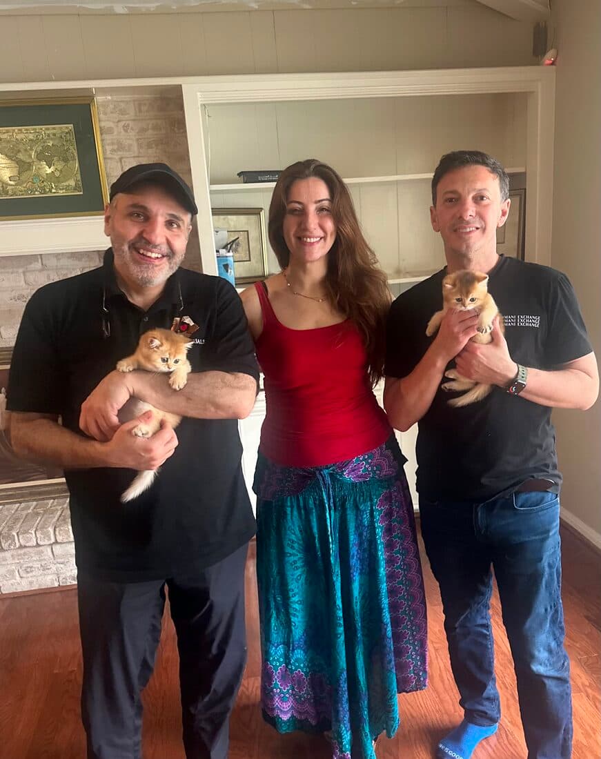 A family collecting their British Shorthair kitten from Houston Cat Mom Cattery in Houston, Texas