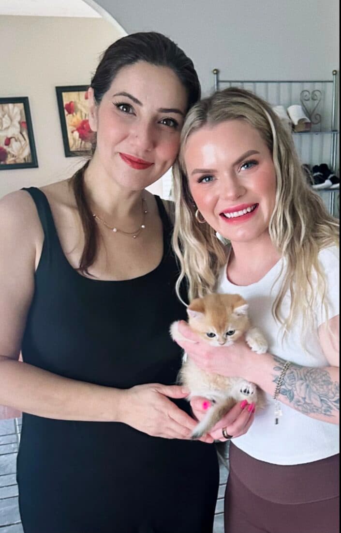 A family collecting their British Shorthair kitten from Houston Cat Mom Cattery in Houston, Texas