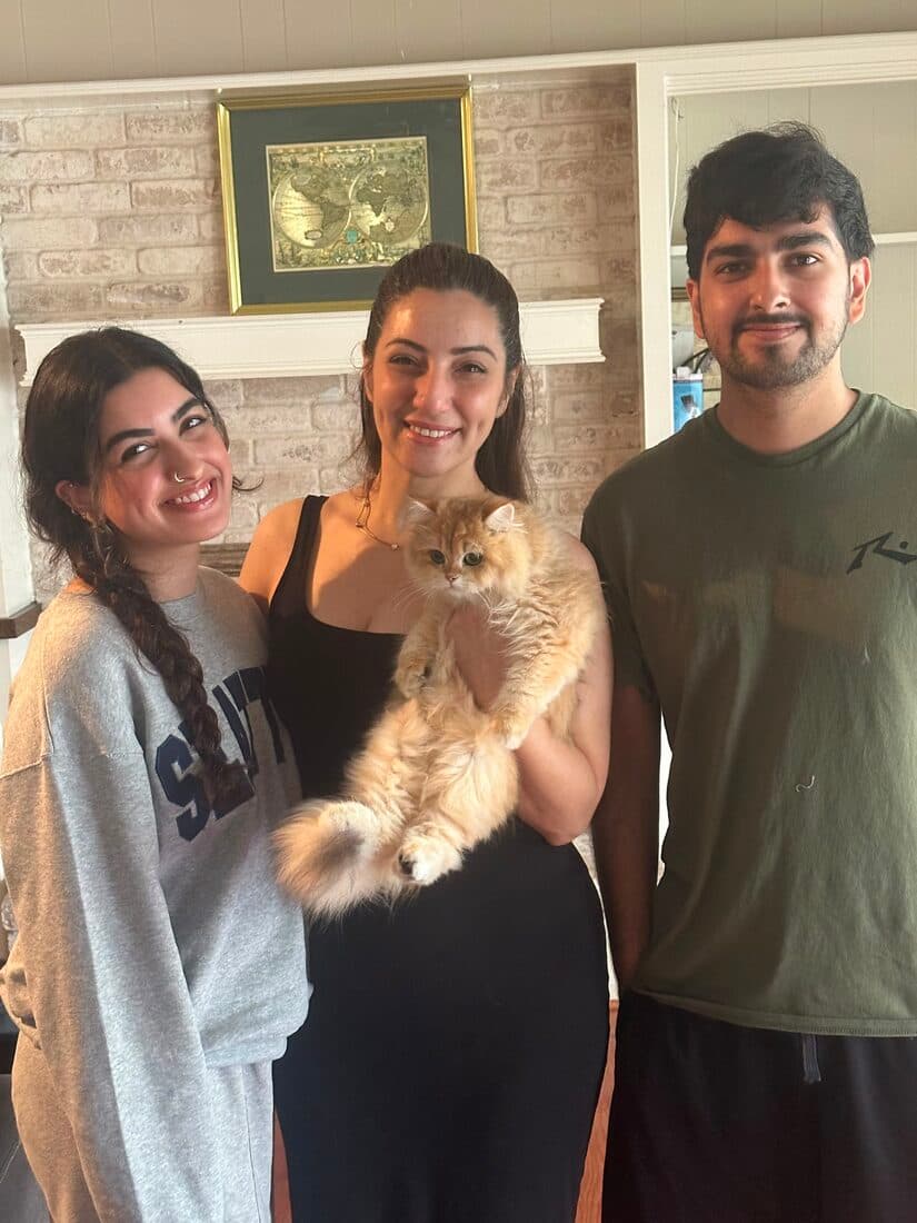 A family collecting their British Shorthair kitten from Houston Cat Mom Cattery in Houston, Texas