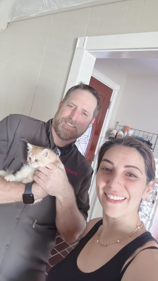 A family collecting their British Shorthair kitten from Houston Cat Mom Cattery in Houston, Texas
