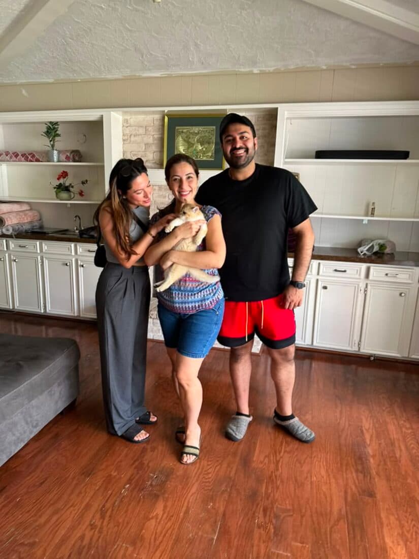 A family collecting their British Shorthair kitten from Houston Cat Mom Cattery in Houston, Texas