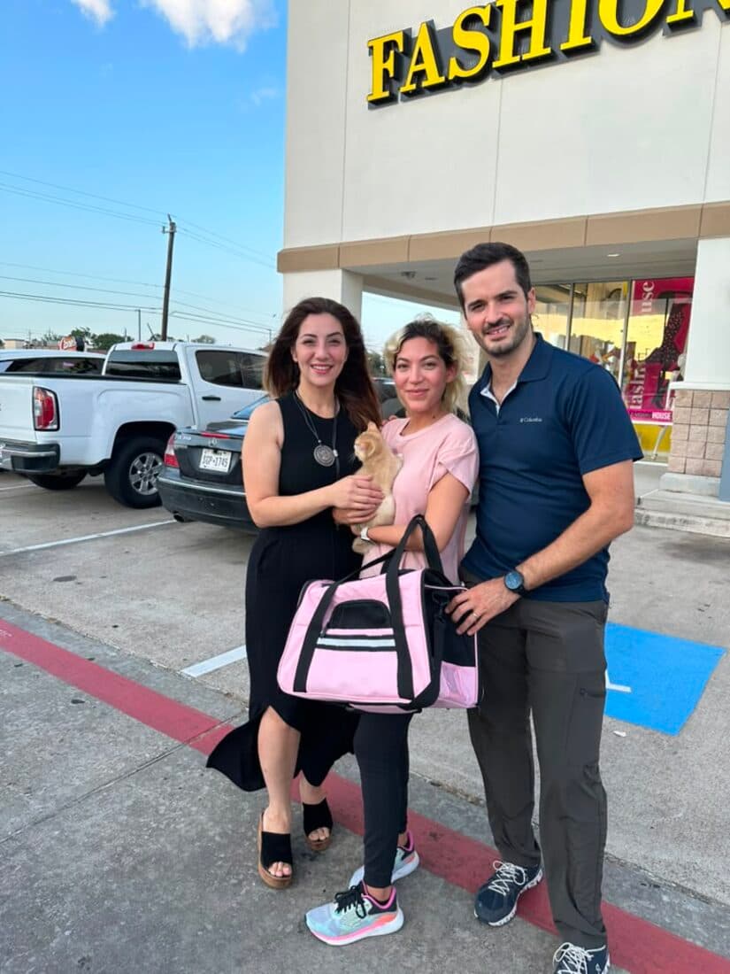 A family collecting their British Shorthair kitten from Houston Cat Mom Cattery in Houston, Texas