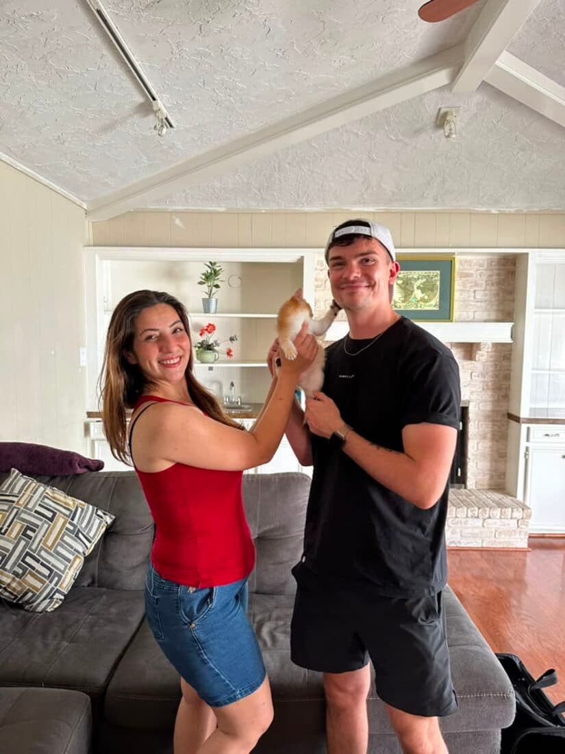 A family collecting their British Shorthair kitten from Houston Cat Mom Cattery in Houston, Texas